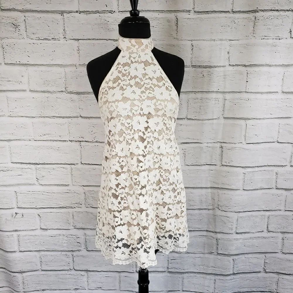 NBD XS White lacy halter Top open back dress mini lined